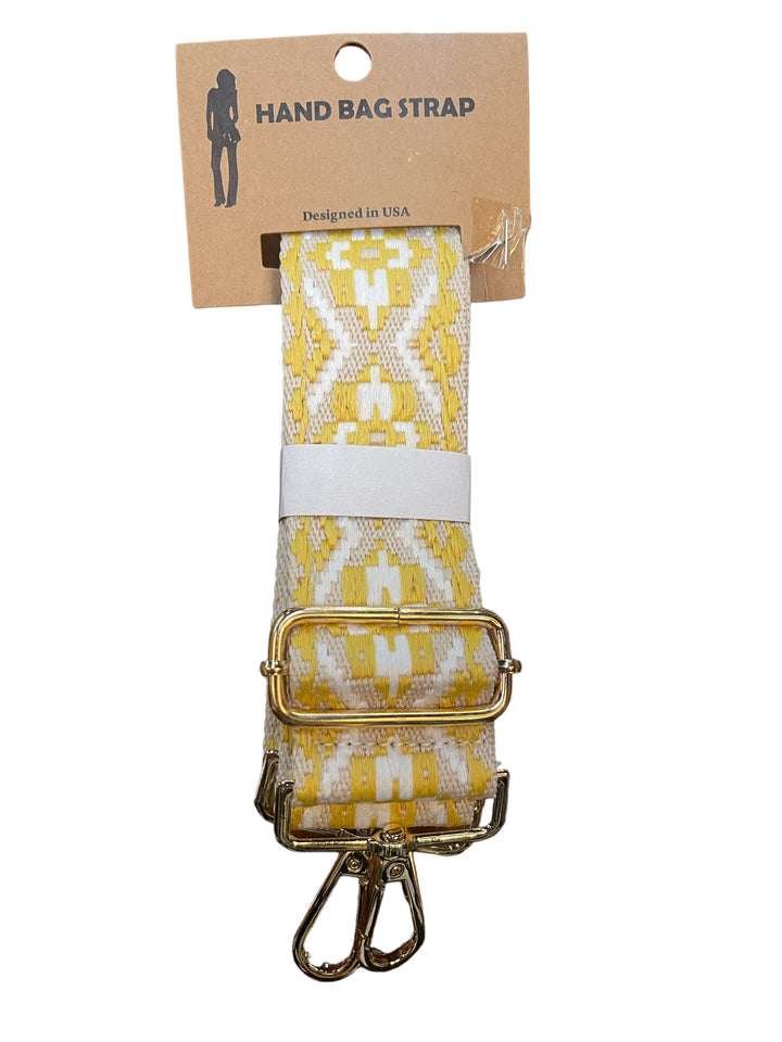 Yellow and white geometric handbag strap, gold-toned hardware; packaging says "HAND BAG STRAP," sizes available.