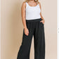 Black fringed linen pants in oatmeal and black color. Available in plus sizes.