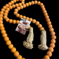 Orange Beads with Tassels