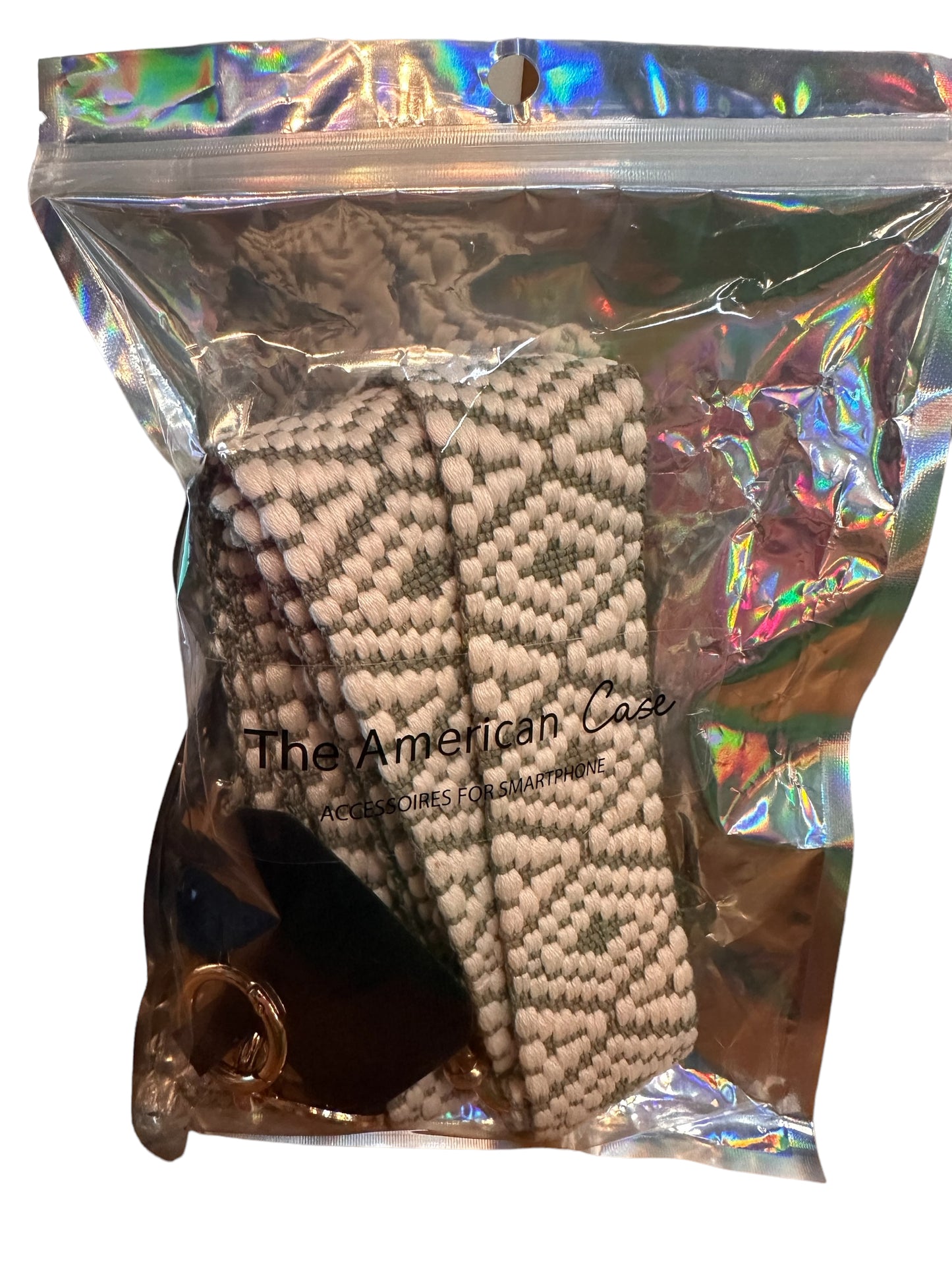 This product is a knitted beanie, marked with an internal label stating "the american coze accessories". It is securely packaged in a reflective, translucent plastic bag featuring a zip closure for easy access. The package includes adjustable crossbody phone straps. Available in one size that fits all.