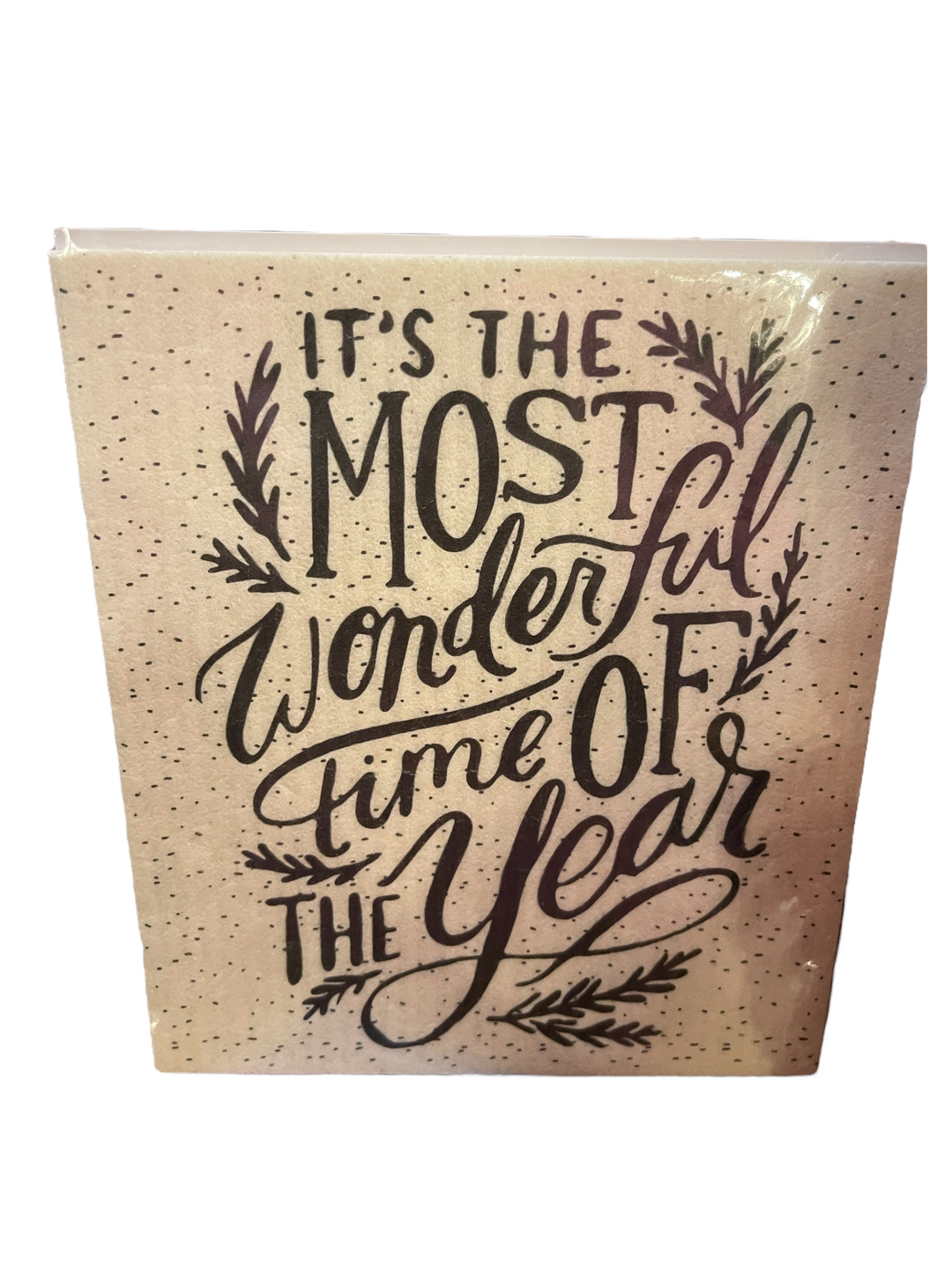 Christmas Tablesugar Collection organic square dish cloth with a speckled pattern and “It’s the most wonderful time of the year” script.