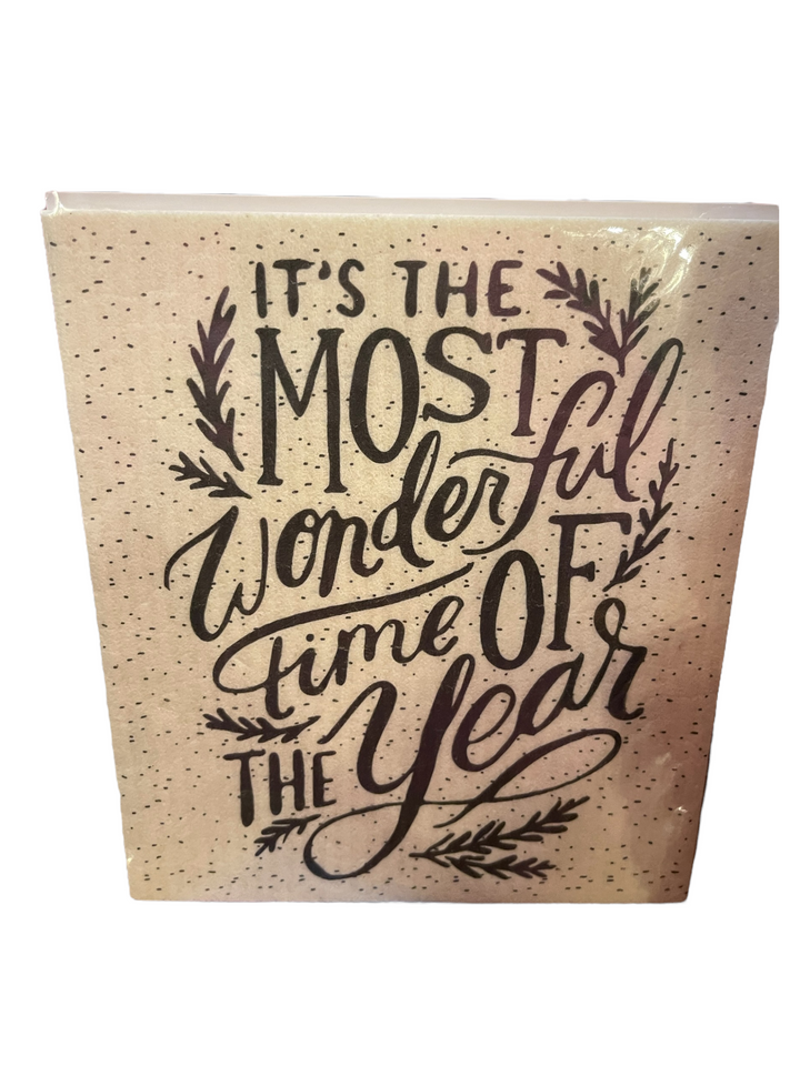Christmas Tablesugar Collection organic square dish cloth with a speckled pattern and “It’s the most wonderful time of the year” script.