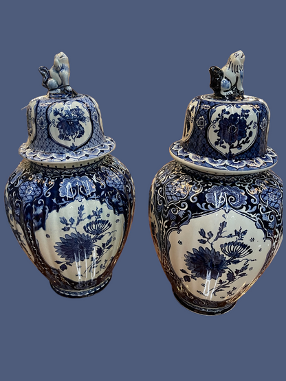 Set of 2 Boch Royal Sphinx Blue Delft ginger jars, 15.5" tall, with lion-topped lids and ornate blue floral decoration.