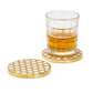 Round gold-rimmed coaster with white geometric pattern; available sizes: set of 4.