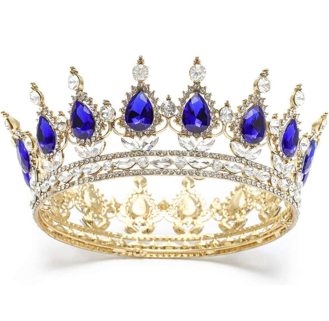 Vintage gold crown with teardrop blue gems, clear crystals, and ornate details. Available in small, medium, and large.