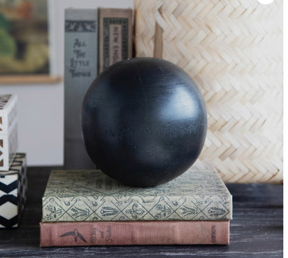 Black spherical object, available in 8cm and 12cm diameter sizes.