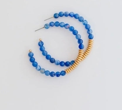 Hoop earrings with blue beads and small gold rings accents. Sizes available: Small, Medium, Large.