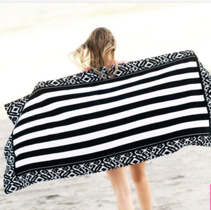 Beach towel with black-and-white stripes and geometric border. Available in sizes: 30"x60", 36"x72".