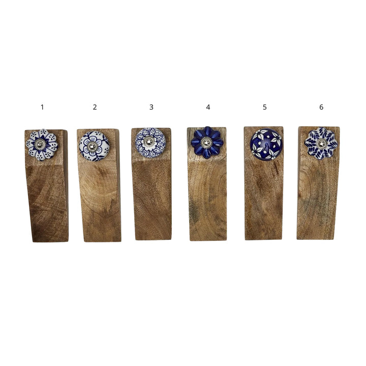 Set of six mango wood Chinoiserie door stops with unique blue and white ceramic knobs, numbered 1-6; available in multiple sizes.