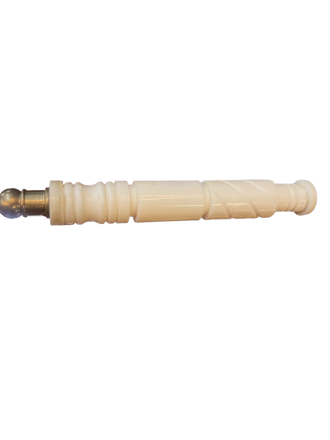 Ivory-colored cylindrical candle snuffer with grooves and brass tip; available in one size.