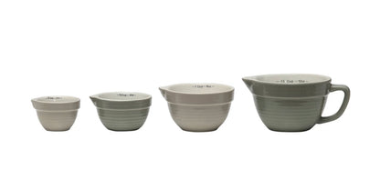 Set of 4 neutral-toned stoneware batter bowls, labeled inside; largest has handle and spout. Sizes: 1/4, 1/3, 1/2, 1 cup.