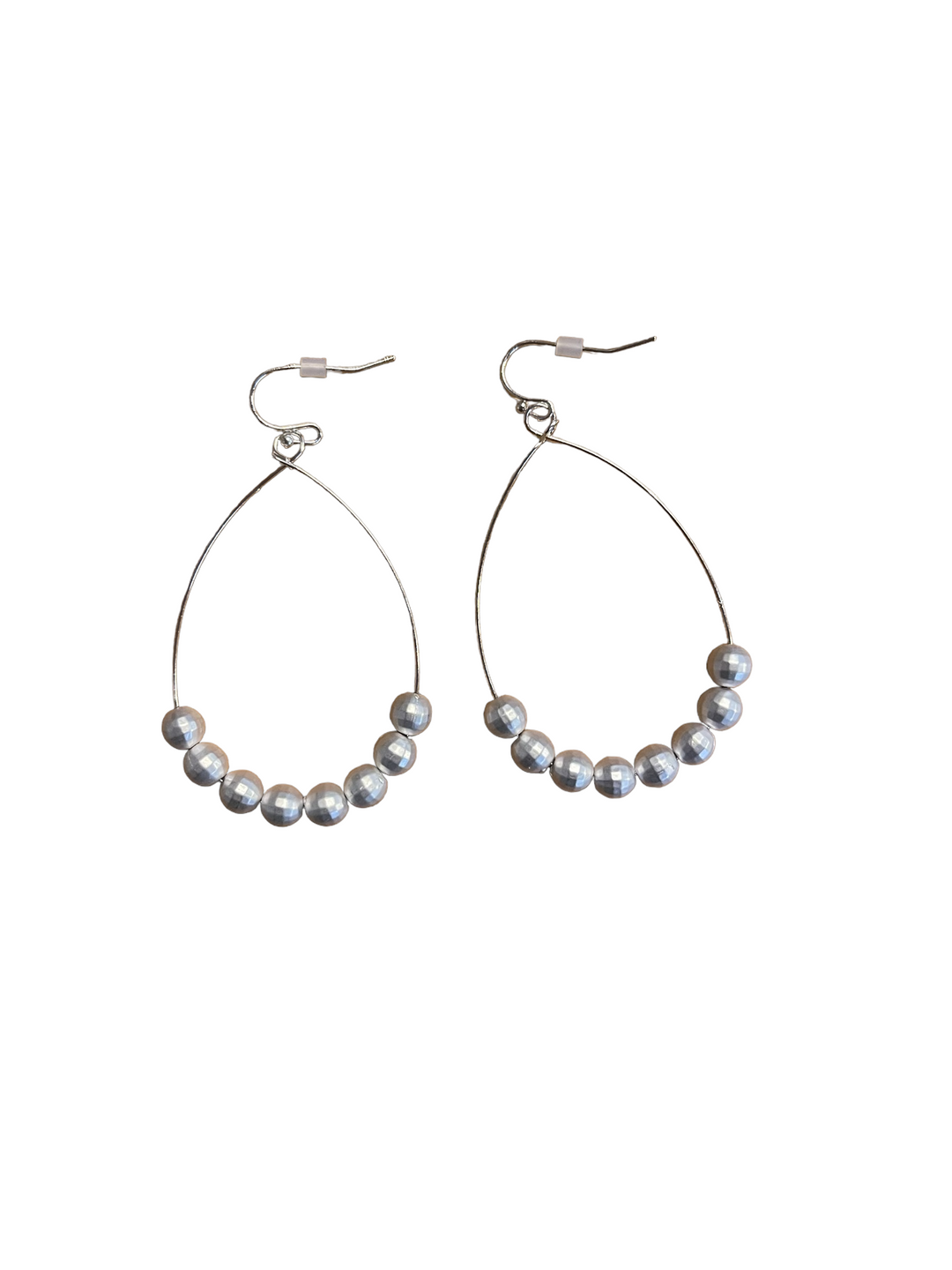 Teardrop silver wire dangle earrings with seven round beads at the base. Available in small, medium, and large sizes.