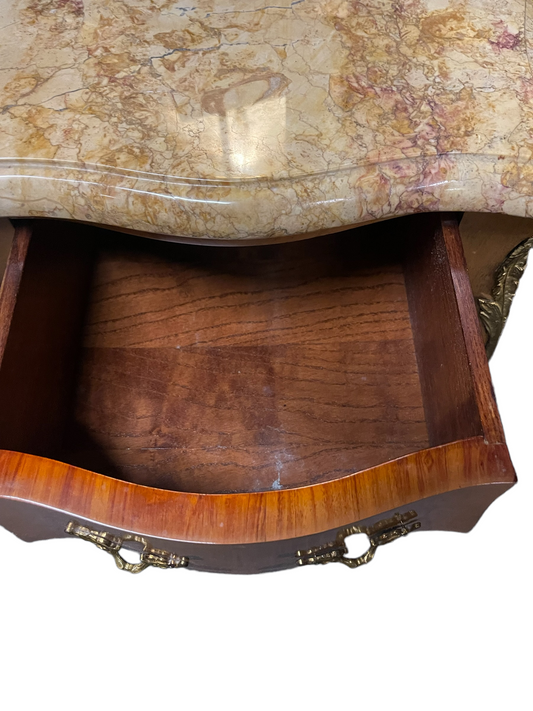 Open wooden drawer with brass handles in a mahogany side cabinet with marquetry, ormolu trim, marble top. Sizes: various.
