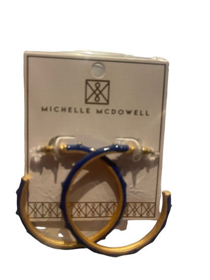 Blue and gold Michelle McDowell earrings with clear plastic backings. Available sizes: small, medium, large.