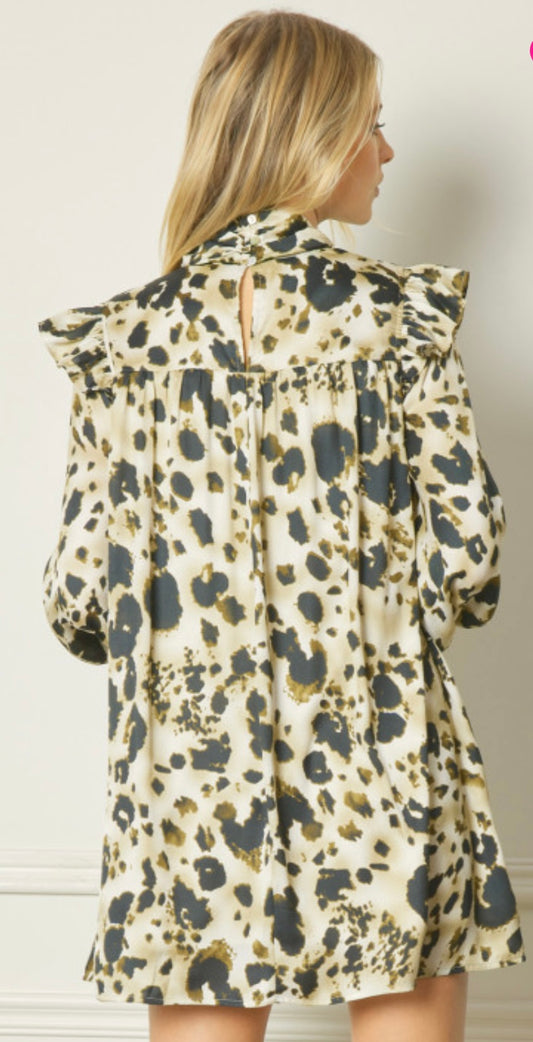 The product is a High Neck Dress in brown. It incorporates pintuck detailing and features a high collar along with an eye-catching leopard print pattern. Available sizes include Small, Medium, Large, and Extra Large.