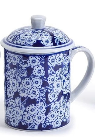 Hand-painted blue porcelain mug with white floral pattern, handle, lid. Size options available for model 53592-20.