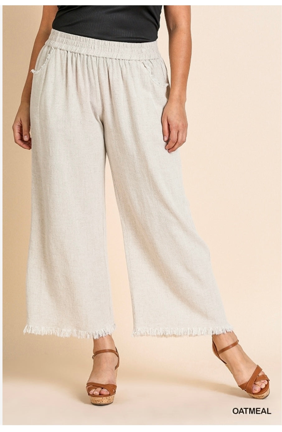 These linen pants are available in Oatmeal and Black colors. They provide a flattering fit, offering both comfort and style. The product is available in plus sizes.