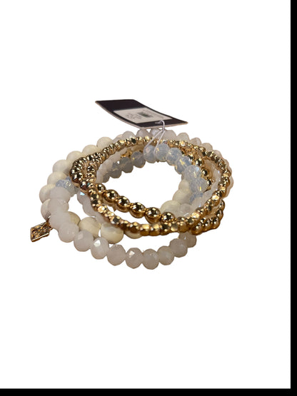 Mandy Bracelet set: three bracelets—white beads, gold beads, translucent crystals. Sizes: S, M, L.
