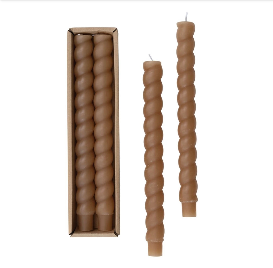 Four unscented cappuccino twist taper candles. Sizes available: standard (10 in) and mini (6 in).