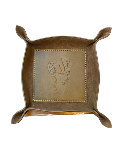 Leather valet tray with raised corners and embossed longhorn design in center. Available in small, medium, and large sizes.