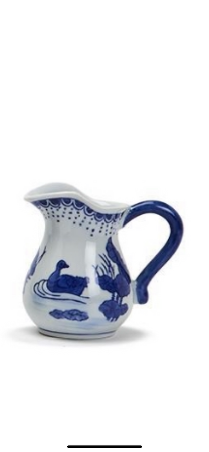White porcelain Canton Small Pitchers with blue handles and bird-and-water patterns; available in multiple sizes.