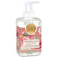 The product is a soap dispenser housing pink, foaming liquid. It is transparent and features a floral label with "Blush Peony Foaming Soap" written on it, complemented by an attractive gold seal.