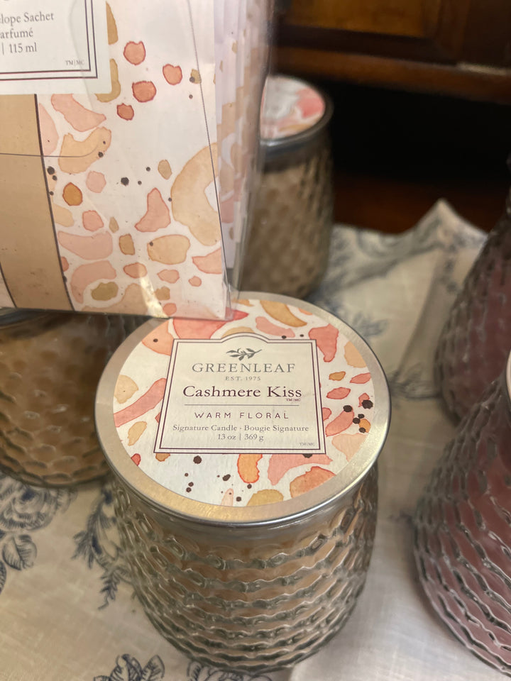 Cashmere Kiss candle in a 13 oz. textured glass jar. Also available in multiple sizes.