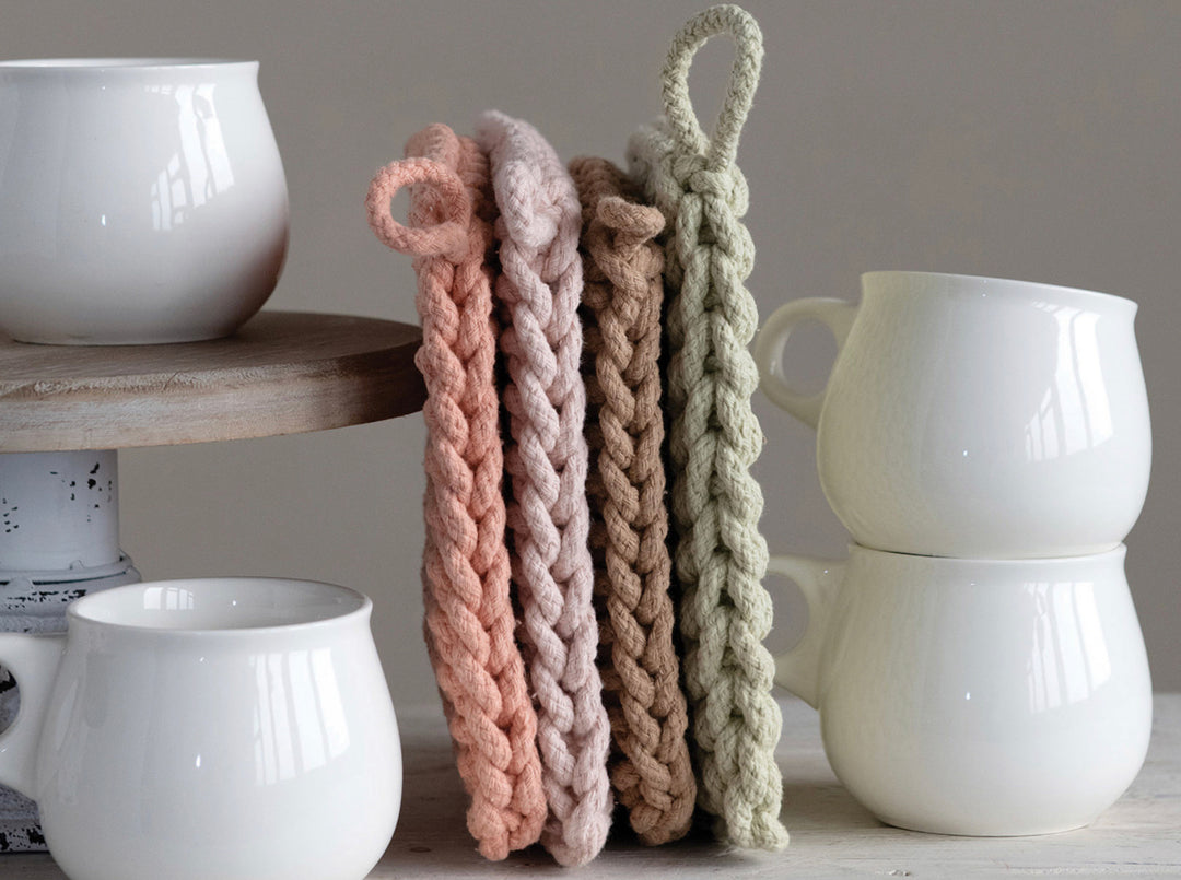 Set of four chunky cotton crocheted potholders in soft pastels. Available in 6"x6" and 8"x8" sizes.