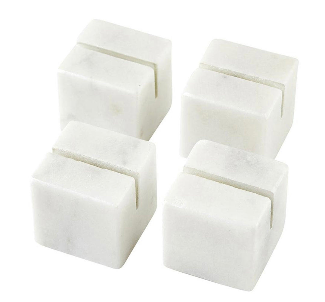 Set of four marble place card holders with a single narrow groove on top. Available sizes: 2", 3", and 4".