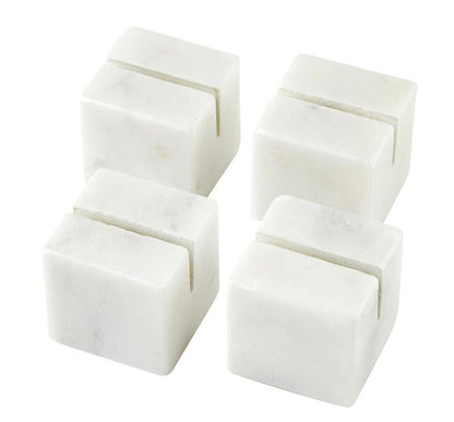Set of four marble place card holders with a single narrow groove on top. Available sizes: 2", 3", and 4".