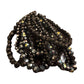Glass Beaded Strand Bracelet with black faceted iridescent beads in overlapping loops. Available sizes: S, M, L.
