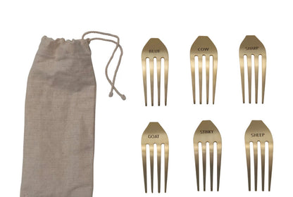 Set of 6 stainless steel cheese markers with brass finish, labeled; includes drawstring pouch. Size info not provided.