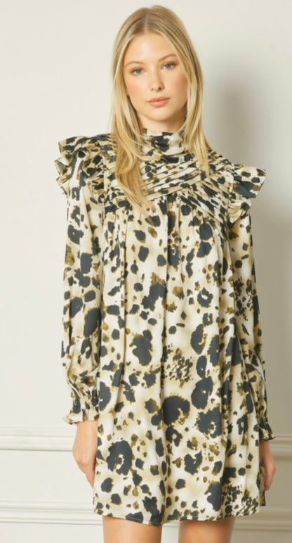 This Brown High Neck Dress features pintuck detailing and a black and gold abstract animal print. Sizes available are small, medium, and large.