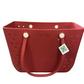 Large red rubber tote with two handles, white button accents, perforated design, "JANE MARIE" on front. Sizes: Large.