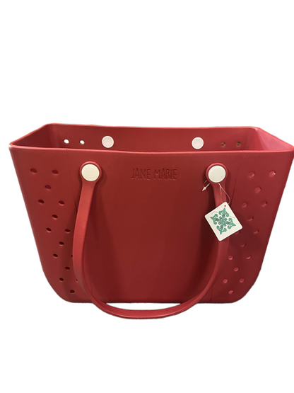 Large red rubber tote with two handles, white button accents, perforated design, "JANE MARIE" on front. Sizes: Large.