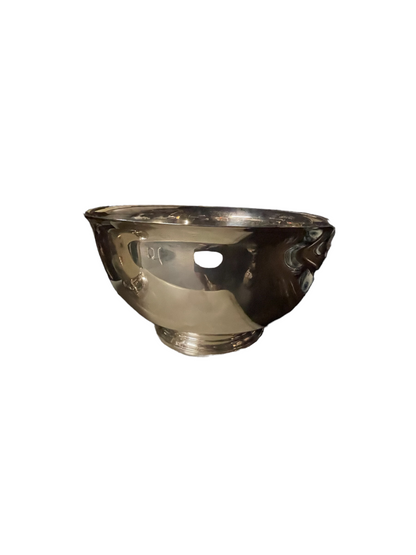 Shiny, reflective silver plated champagne bucket and punch bowl with round base and wide opening. Available in multiple sizes.