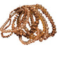 Glass Beaded Strand Bracelet with small faceted brown, gold, and amber beads. Available in S, M, L sizes.