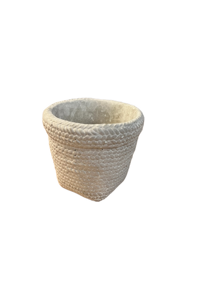 Small, square white basket-pattern planter with textured surface and light beige color. Available in multiple sizes.