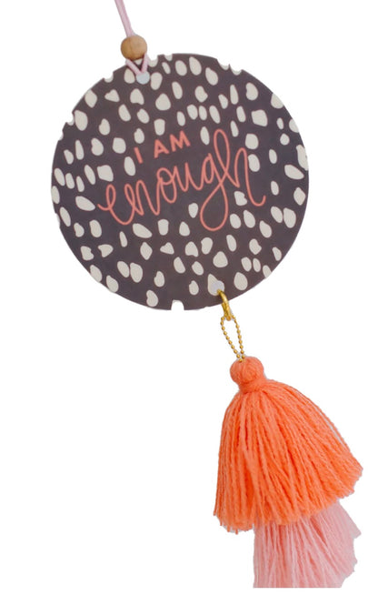 assel is attached. The air freshener measures 2.75 inches in diameter.