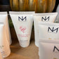 Paraben-free 2.6 oz Green Tea and Peony Travel Hand Cream tubes are available.