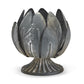 The Laurel Leaf Decorative Cachepot with weathered zinc, petal-like metal pieces on a fluted base. Available in two sizes.