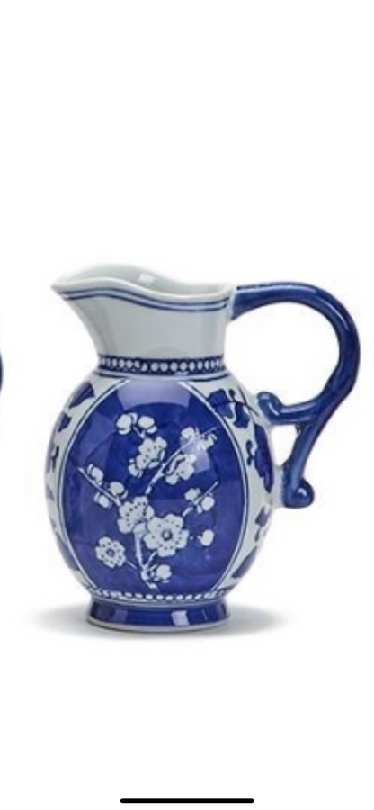 The Canton Small Pitchers: blue and white ceramic, floral Canton patterns, curved handle. Available in multiple small sizes.
