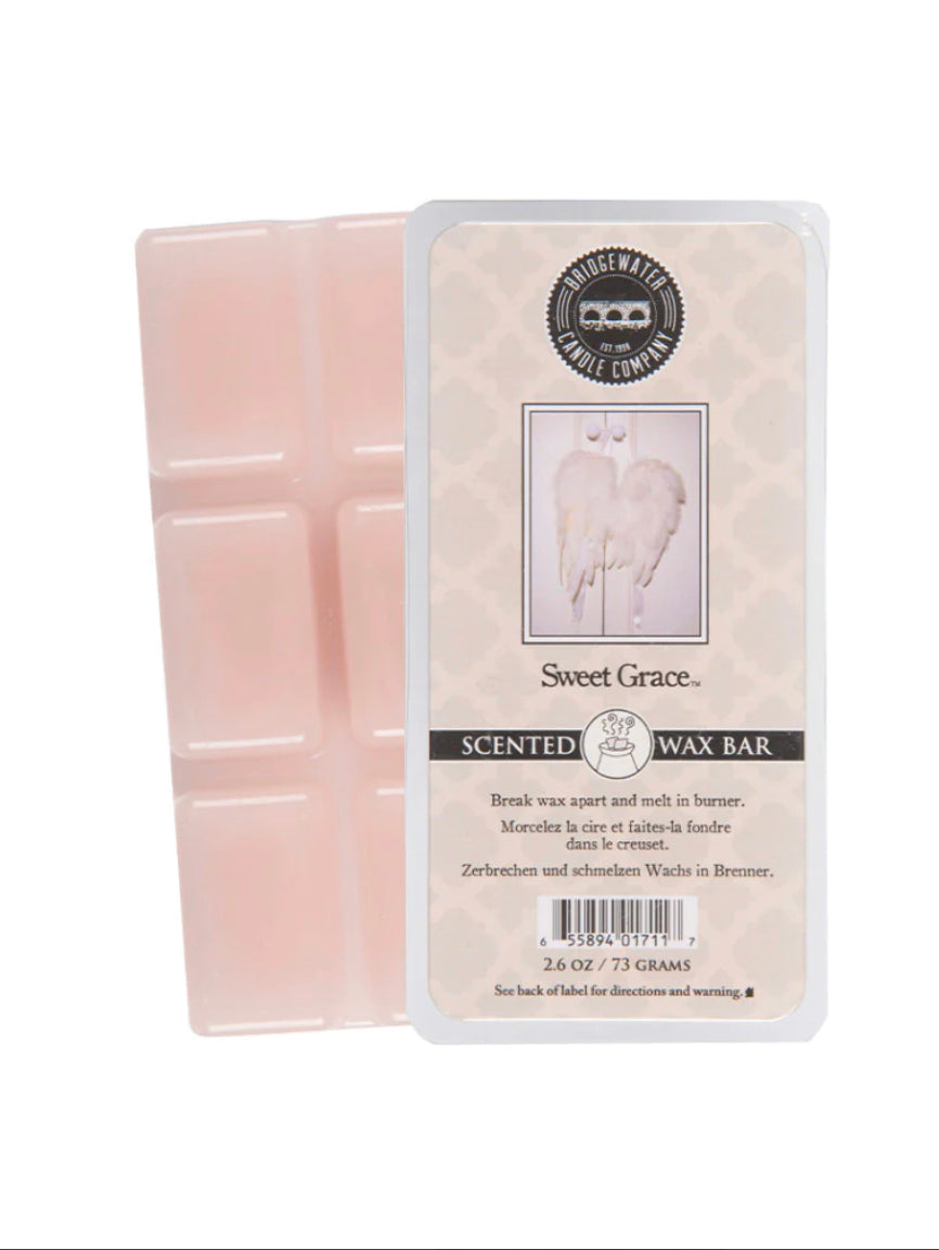Pink Sweet Grace soy-blend wax bar in beige, angel-winged packaging, labeled "Sweet Grace." Available in multiple sizes.