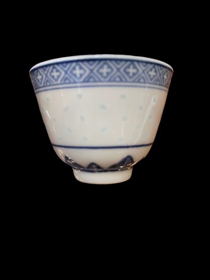 Vintage tea cup with dragon rice, blue geometric border, subtle polka dots on white porcelain. Sizes: small, medium, large.