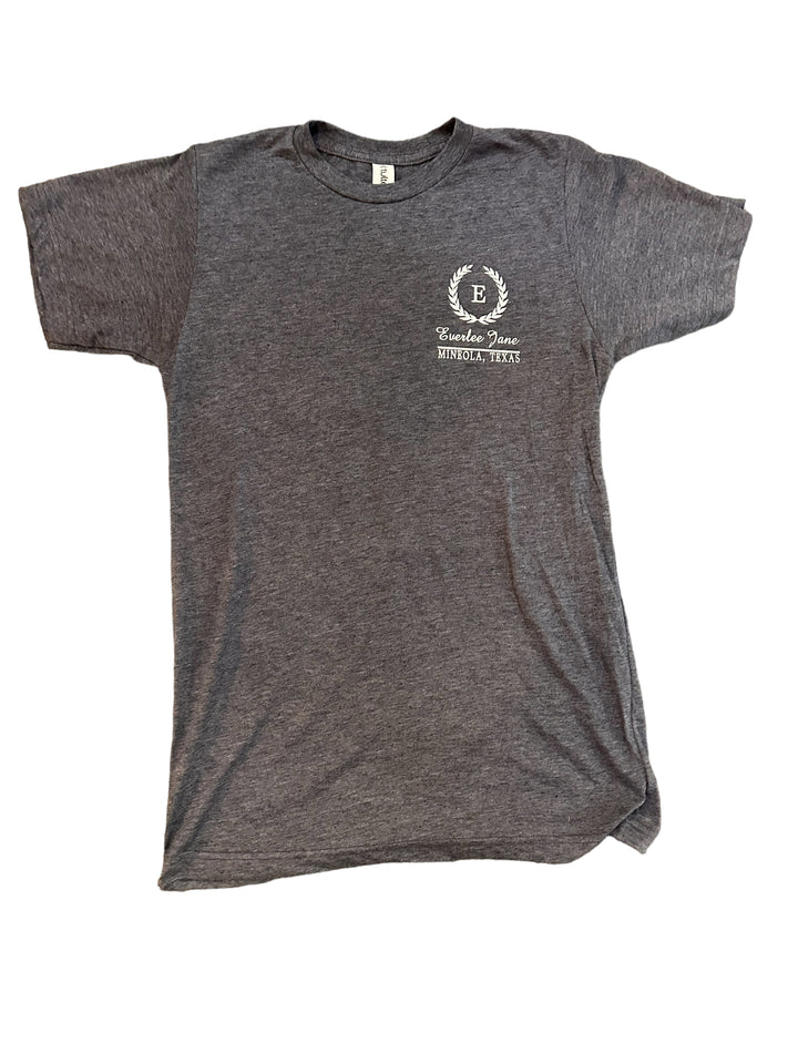 An Everlee Jane Tshirt displayed on a white background, featuring a printed logo on the left side of the chest that includes an eagle design and the text "freedom planet motorcycle".