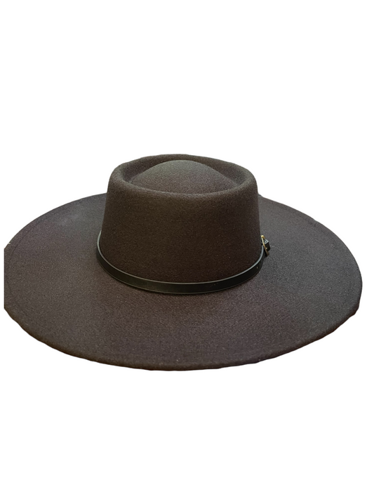 The Maurice Wool Hat Black has a wide brim, dark brown felt, rounded crown, thin black buckle band. Available in one size.
