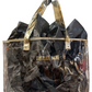 Clear tote bag with gold handles and trim, black tissue, "EVERLEE JANE" in gold. Stadium-approved. Sizes: S, M, L.