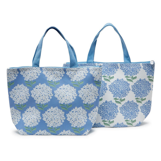 Hydrangea Thermal Lunch Totes with blue handles, in blue or white backgrounds; available in standard and large sizes.