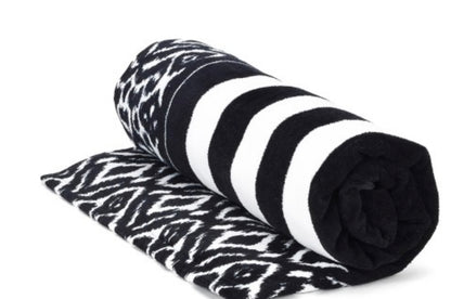 Black and white cotton beach towel with bold stripes and geometric patterns. Available sizes: 30"x60", 35"x70".