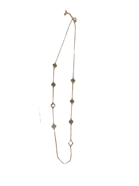 Long gold necklace with silver and gold clover pendants featuring intricate designs. Available in 18", 24", and 30" lengths.